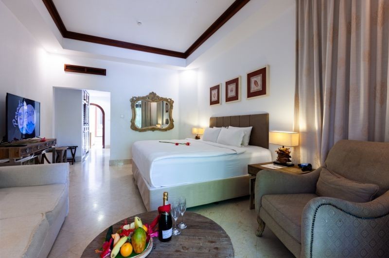 beachfront terrace suite with beach access & balcony