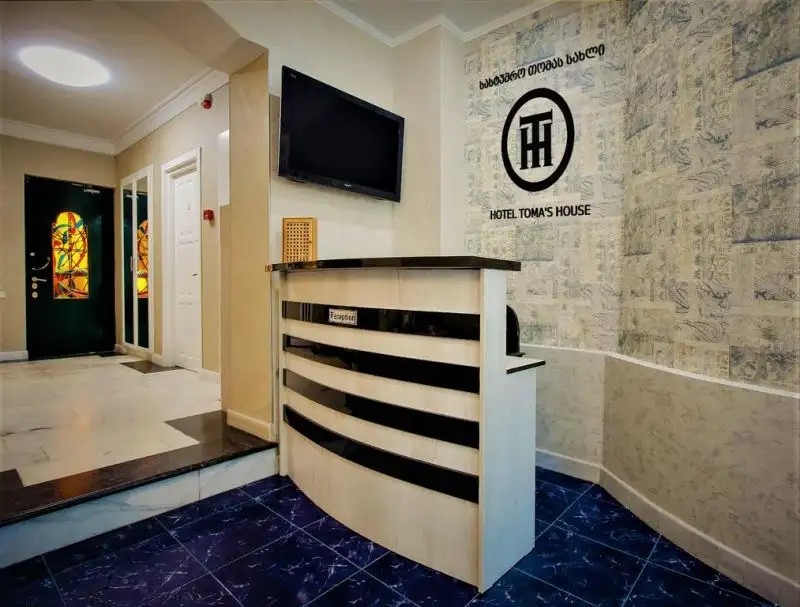 TOMAS HOUSE