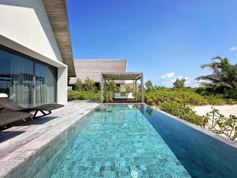 serene pool villa sunset view