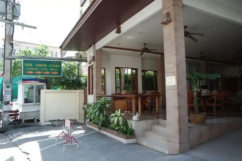 NEW NIKOM COURT