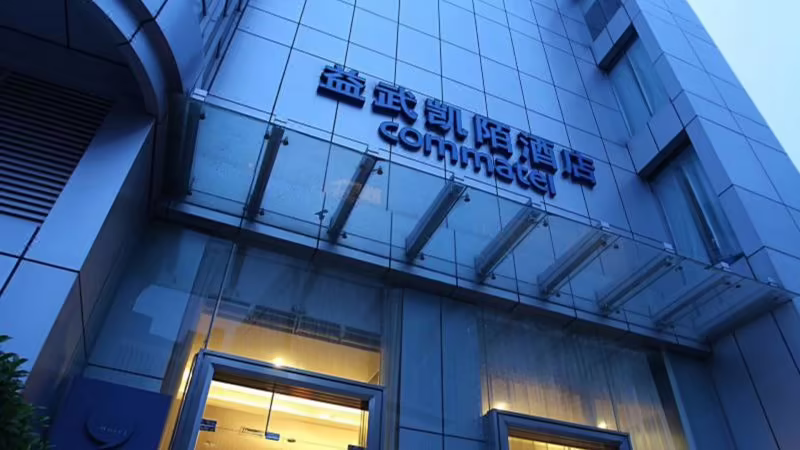 YI WU COMMATEL